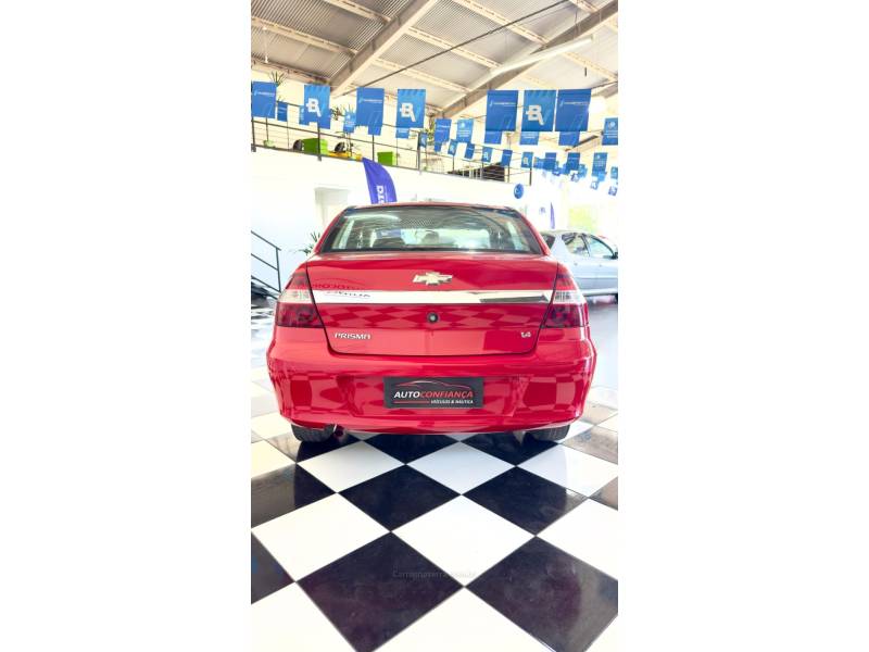 CHEVROLET - PRISMA - 2012/2012 - Vermelha - R$ 33.900,00