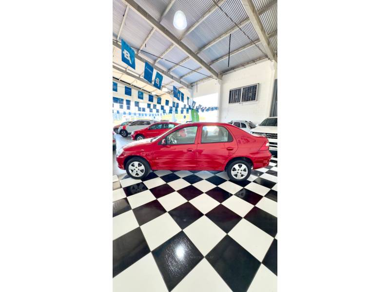 CHEVROLET - PRISMA - 2012/2012 - Vermelha - R$ 33.900,00